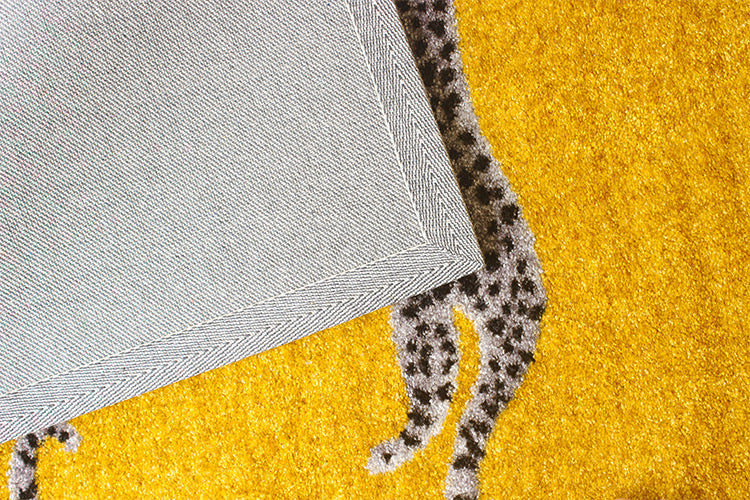 Bright yellow cheetah carpet